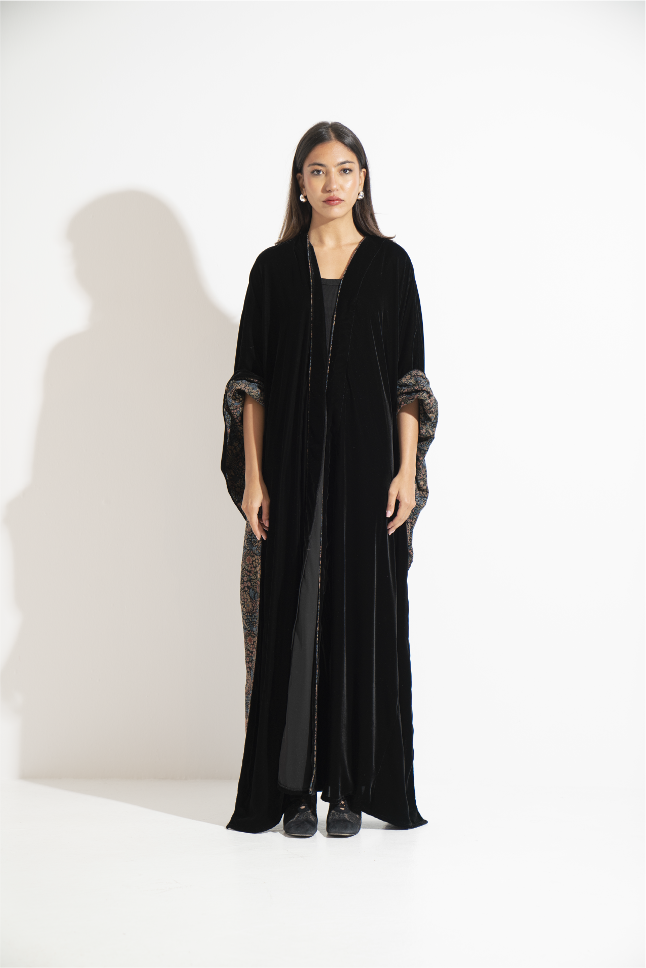 Black velvet abaya with a patterned interior lining  A12