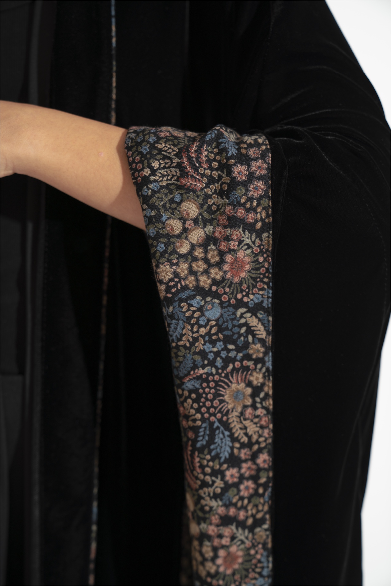 Black velvet abaya with a patterned interior lining  A12