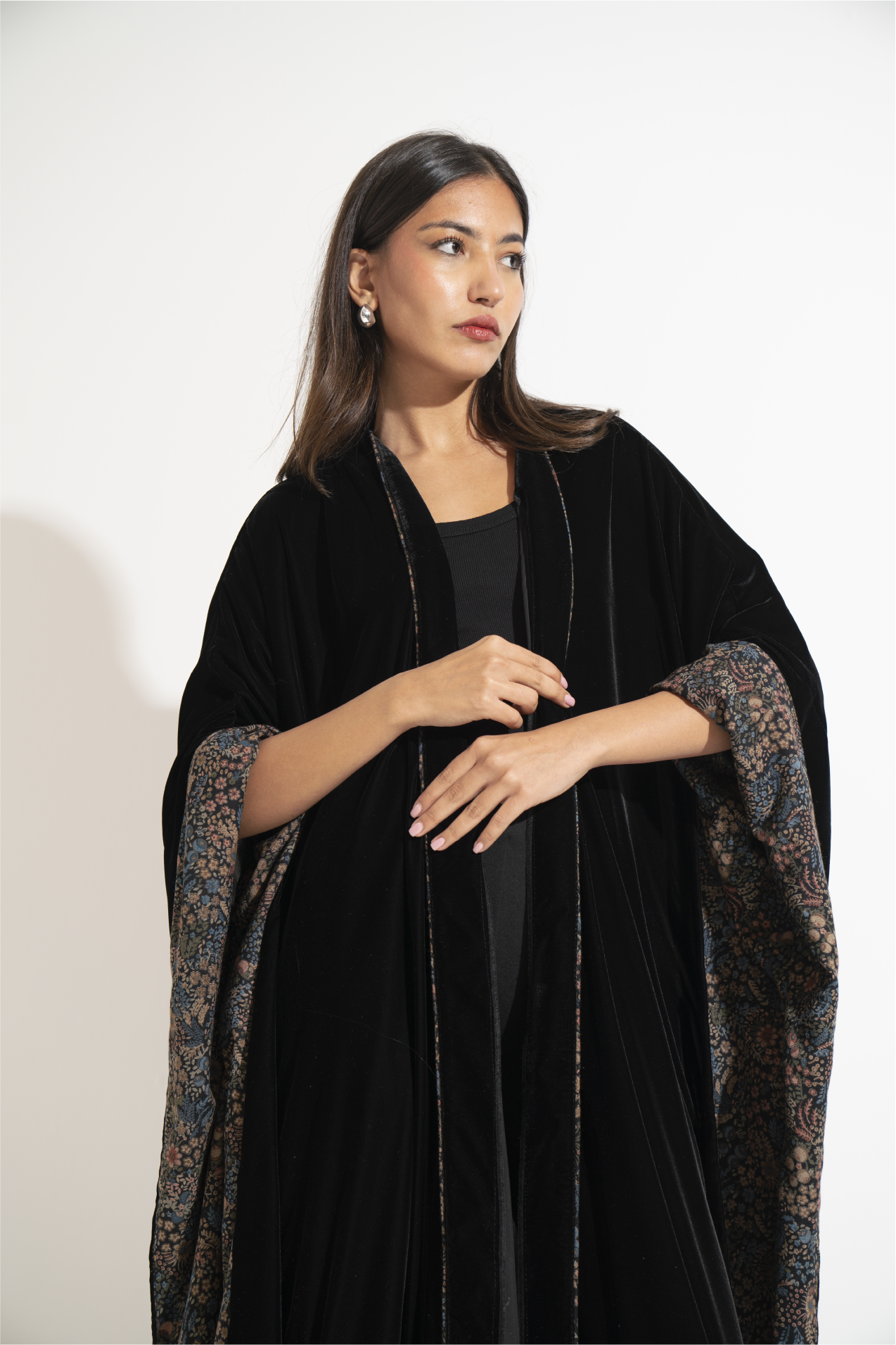 Black velvet abaya with a patterned interior lining  A12