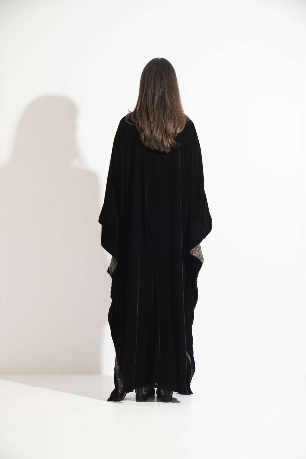 Black velvet abaya with a patterned interior lining  A12